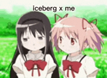 a couple of anime girls are standing next to each other in a park .