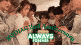 a group of people standing around a cake that says ' always forever '