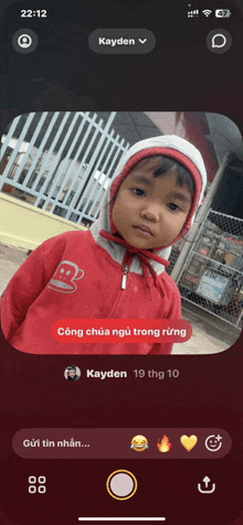 a phone screen shows a picture of a little girl and says kayden in the upper right corner