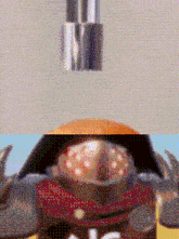 a close up of a cartoon character with the letter a on his shirt