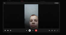 a screen shot of a video call with a red x on the bottom right