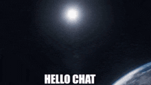a close up of a black hole with the words `` hello chat '' written on it .