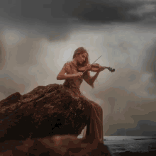 Girl With Violin Thunder GIF - Girl With Violin Thunder GIFs