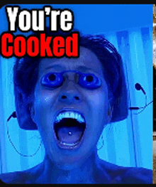 a woman with blue eyes is screaming with the words you 're cooked above her head