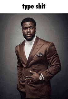 a man in a brown suit and white turtleneck stands with his hands in his pockets