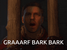 a man behind a fence with the words graaarf bark bark below him