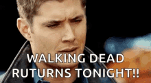 a man is making a funny face with the words `` walking dead returns tonight !! ''