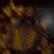 a blurry picture of a person 's face with a red heart on it