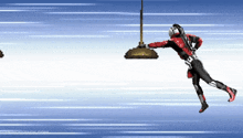 a man in a red suit is jumping in the air in a video game
