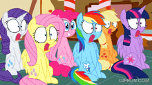 a group of ponies with their mouths open and the website gifrun.com visible