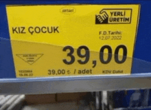 a yellow sign with the price of 39.00 on it