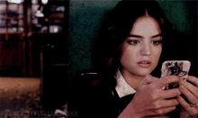 pretty little liars aria montgomery phone cell phone looking at phone