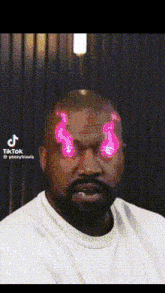 a man with a beard is wearing a white shirt and has pink flames coming out of his head .