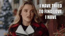 a woman in a plaid jacket is saying i have tried to find love , i have .