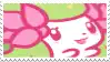 a close up of a pink and white cartoon character on a postage stamp .