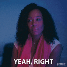 a woman with curly hair says yeah right
