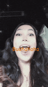 a woman is making a funny face with the word bu hahaha written on her face