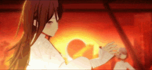 a girl with long brown hair is standing in front of a fire