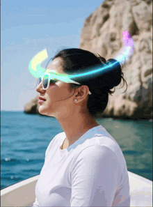 a woman wearing sunglasses with a blue light coming out of her head