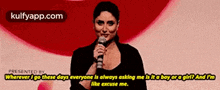 a woman speaking into a microphone with the words wherever i go these days everyone is asking me