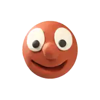 a clay face with a big smile on it