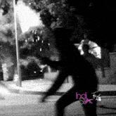 a black and white photo of a man holding a torch with the words india tv spark written on the bottom