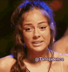 a close up of a woman 's face with a caption that says ' @tvresidence '