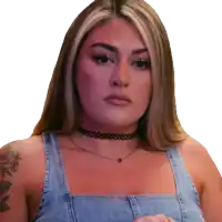 a woman wearing a choker and a denim top
