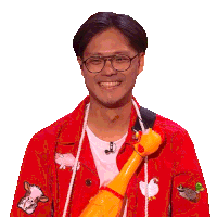 a man wearing glasses and a red jacket holds a stuffed chicken