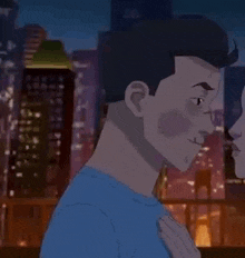 a man and woman are kissing in front of a city skyline at night .