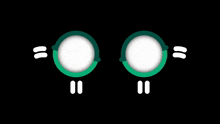 a pair of green circles with a white circle in the middle