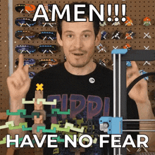 a man holding a 3d printer with the words amen have no fear on the bottom