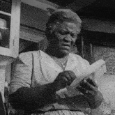 Opening The Letter Lena Younger GIF - Opening The Letter Lena Younger A Raisin In The Sun GIFs