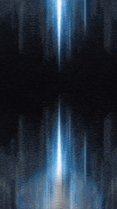 a dark room with a blue light coming out of the middle