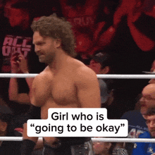 a man in a wrestling ring with the words " girl who is going to be okay " above him