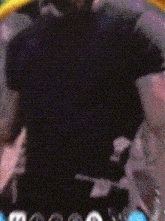 a close up of a person 's back with a black shirt on