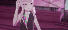 a girl in a suit and tie is standing on a stage in a purple room .