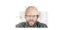 a man with glasses and a bald head