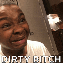 a man is making a funny face with the words dirty bitch behind him