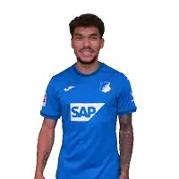 a man wearing a blue shirt with the word sap on the front