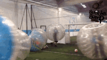 a bubble bump game is being played on a field