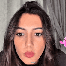 a close up of a woman 's face with the words zedogifs below