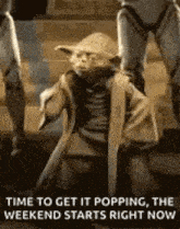 a picture of yoda from star wars dancing on a stage .