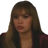 a woman with long hair and bangs is wearing a necklace