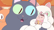 a girl in a cat costume is sitting next to a large cat