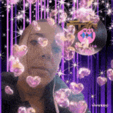 a woman 's face is surrounded by pink hearts and a record that says ' mark ' on it