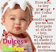 a baby is holding an ice cream cone with dulces suenos written on the bottom