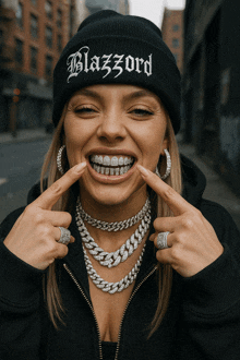 a woman wearing a black beanie with blazzard on it
