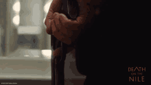 Holding A Gun Death On The Nile GIF - Holding A Gun Death On The Nile Blood Water GIFs