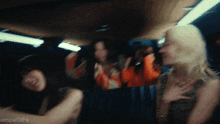 a blurred image of a group of people with the words aespagifs on the bottom